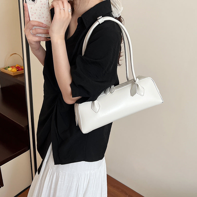 Handheld long-handled bag for baguettes