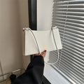 Candy-colored underarm bag