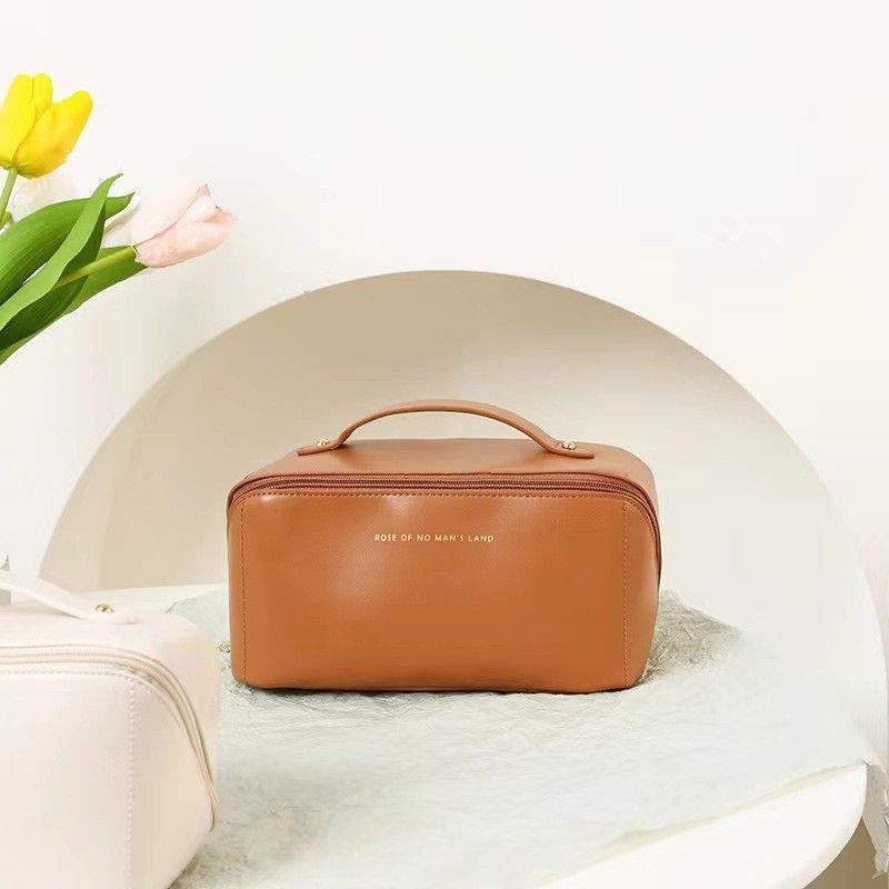The large-capacity makeup bag is portable for going out