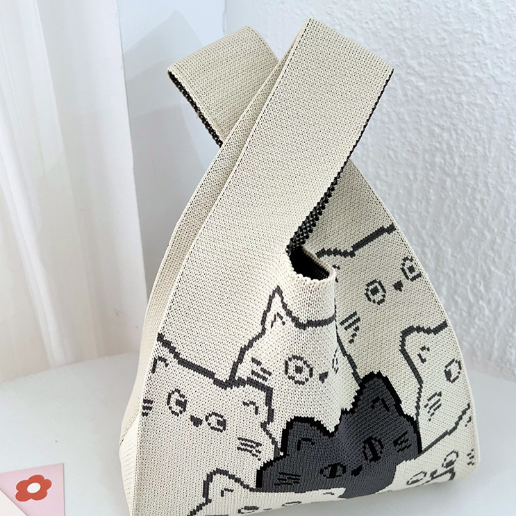 Knitted Woven Handbag with Floral Patterns