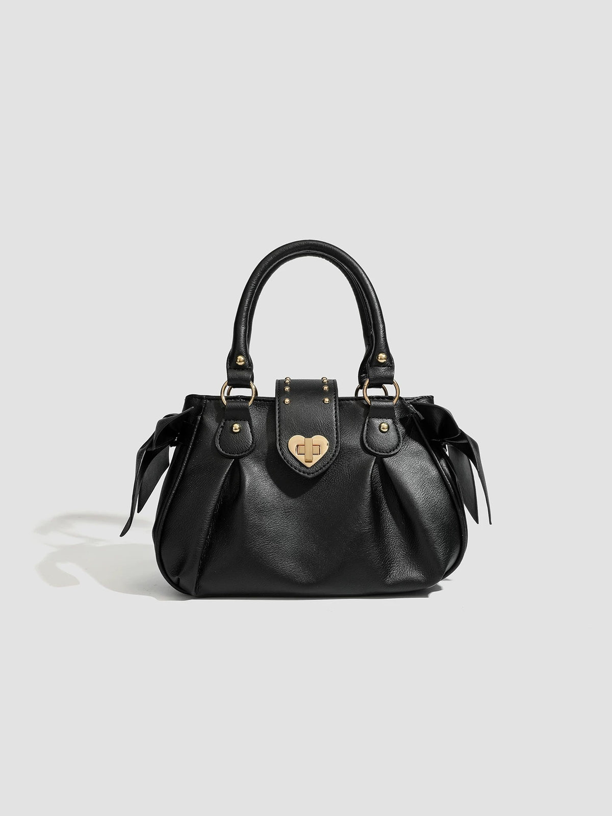 Pink pleated handbag
