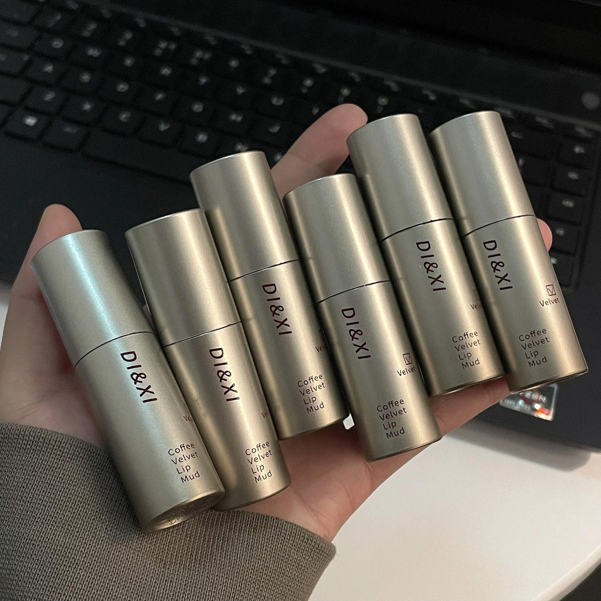 Small silver tube lip gloss